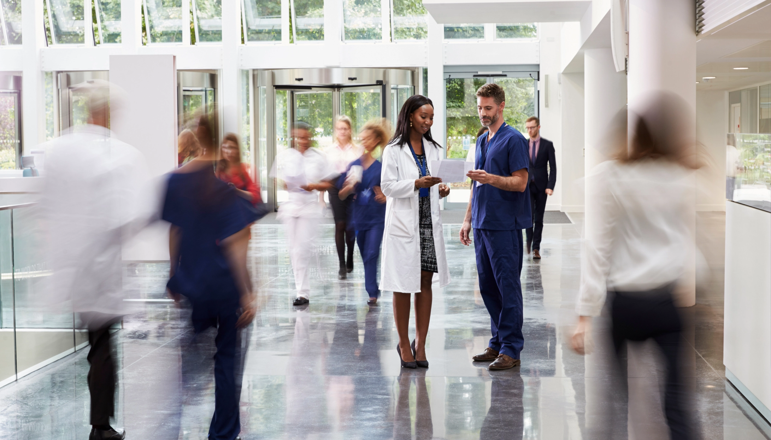 nurse and doctor talking